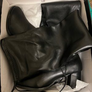 Thigh high boots size 5. Brand new never worn